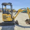 Caterpillar 301.7 CR + 3 Löffel + Anhänger 2021