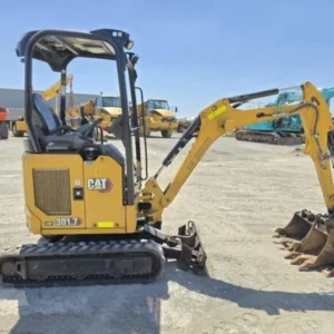 Caterpillar 301.7 CR + 3 Löffel + Anhänger 2021